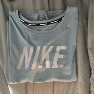 I’m selling a Nike shirt that is a size M. It is an athletic material.